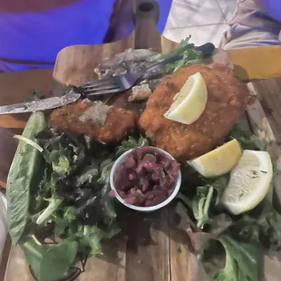 2 Chicken and 2 pork schnitzels, served with potato salad and red cabbage with side of Jager gravy