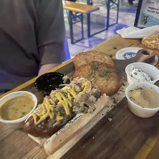 Bratwurst, sauerkraut with a side of potato pancakes.