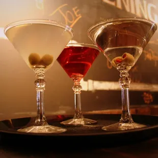 three martinis on a tray