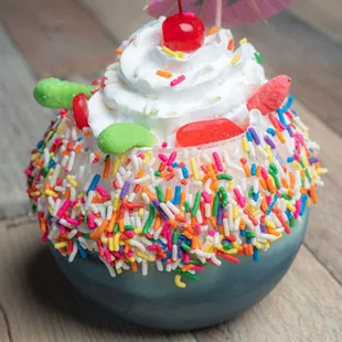  cupcake with sprinkles and an umbrella