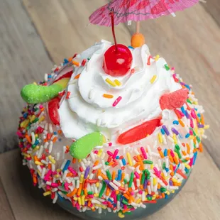  cupcake with sprinkles and an umbrella