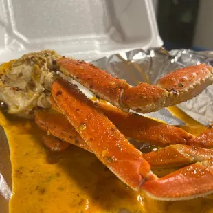 crab legs in sauce