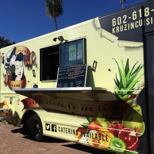 a food truck parked in a parking lot