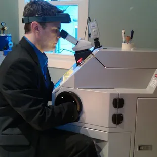 Brad Krysty works on a platinum ring at the laser.