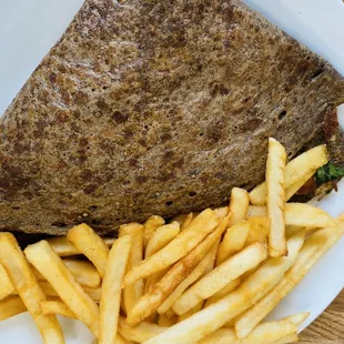 Arsenal Crepe ($12.95):  organic buckwheat crepe w/ mozarella, spinach, onions, tomatoes, mushrooms, cream sauce. w/ Fries.