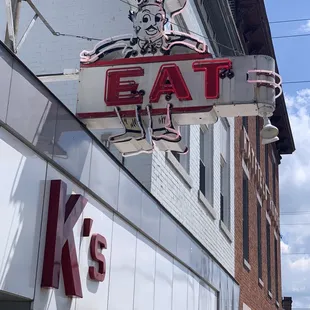 a neon sign for a restaurant