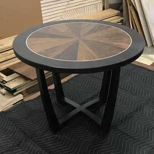 Walnut, Wenge and Maple Sunburst-style side table.