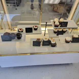 a display of cupcakes
