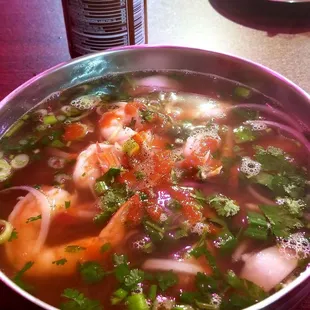 Generous portion of pho with tons of shrimp! Complimentary thai tea