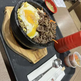 a bowl of food on a tray