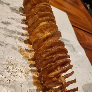 Pretty potato swirl.  Oily and not crispy.