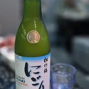 unfiltered sake. complimentary token won from a previous birthday meal