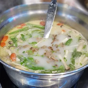 Healthy Herb soup with veggies and grilled meat