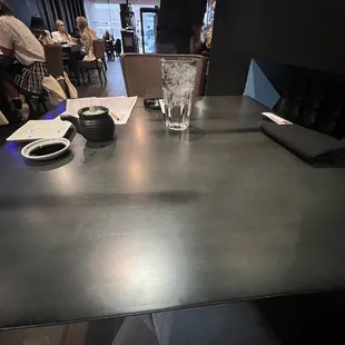 a table with a glass of wine