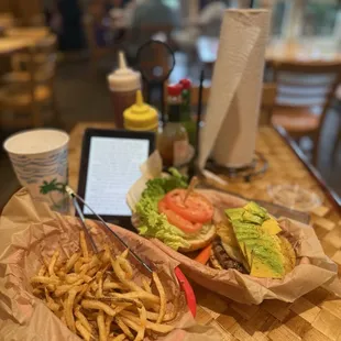 1/3 pound Avocado and Pineapple Burger with fries. Thank goodness for the paper towels!