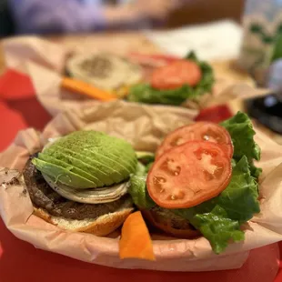  hamburger with lettuce, tomato, and avocado