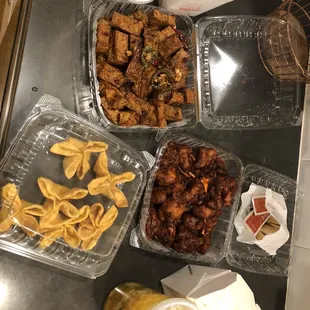 Crab puffs, spring rolls, orange chicken, Kung pao tofu, egg flour soup