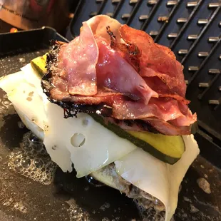 Watching this Cuban sandwich being made is almost as satisfying as taking a bite out of it!