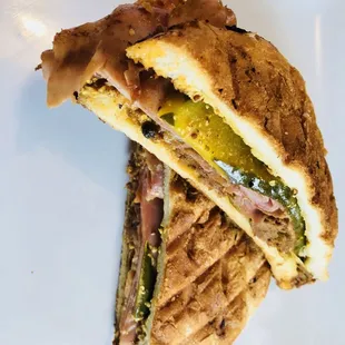 Experience a taste of Cuba with every bite of this mouth-watering Cuban sandwich.