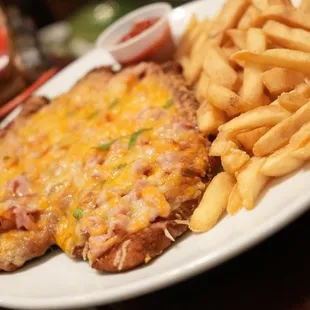 a plate of food with french fries