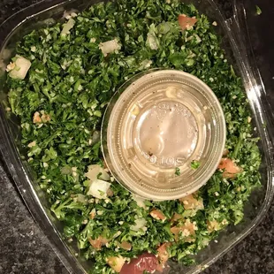 a salad in a plastic container