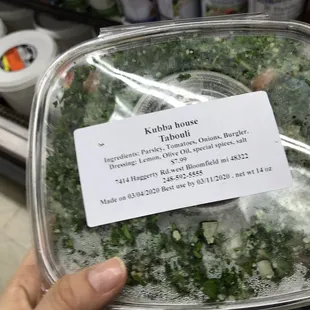 a label on a container of kale