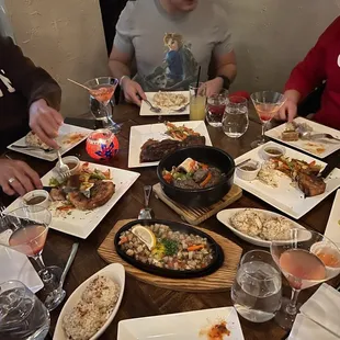 a table full of food and drinks