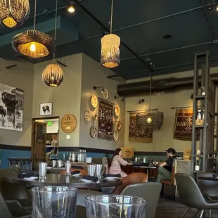 The dining area with a view of the kitchen