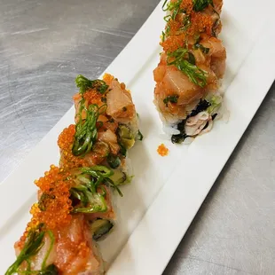 Spicy Lady's Roll- Crab meat, Avocado Topped with spicy hamachi, tobiko & green onion