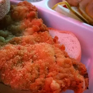 Schnitzel sandwich with potato salad.