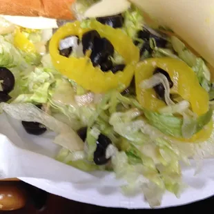 Weak veggie sub. Lettuce, black olives, banana peppers only.