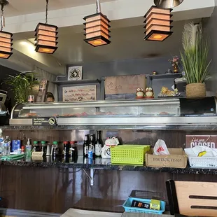 Looking at the sushi counter