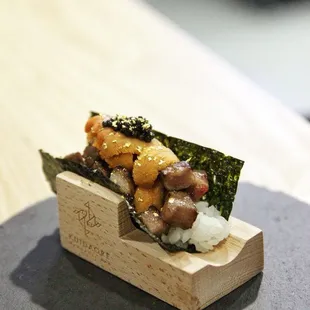 Premium A5 wagyu, uni, and caviar handroll