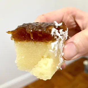 Ubi Kayu-Sago: steamed sago with gula Melaka (palm sugar) layered over cassava, sprinkled with grated coconut