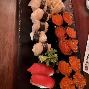 Assorted nigiri: ikura, bluefin tuna, scallop