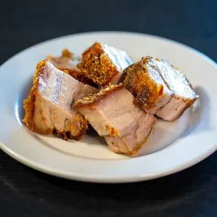 a plate of meat on a table