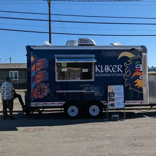 a food truck parked in a parking lot