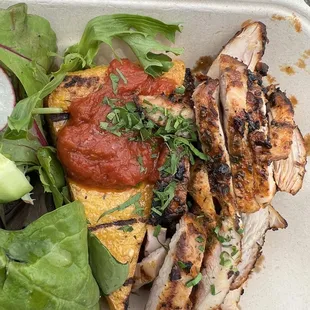 a meal in a styrofoam container