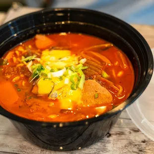 a close up of a bowl of soup