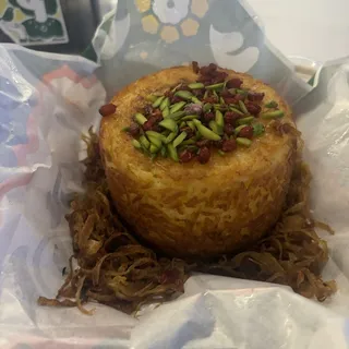 Crispy Saffron Rice Cake with Braised Chicken & Barberries