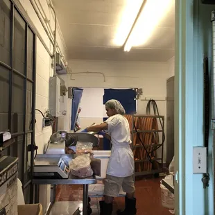 Sausage slicing &amp; sausage hanging in the back