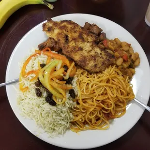 Chicken,  goat, pasta, rice, and a killer bean mix.