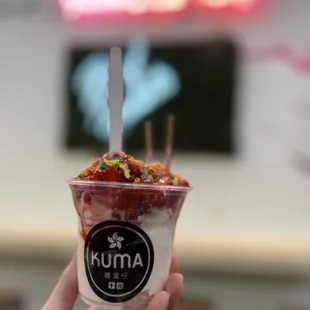 Guava ice cream w fresh strawberries, coconut flakes, strawberry pocky and strawberry sauce