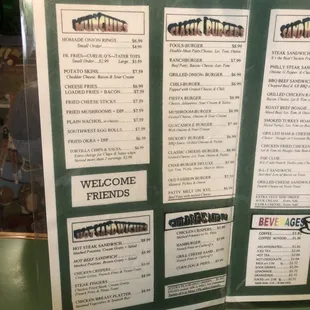 a person holding a menu