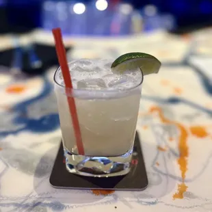 a margarita with a lime slice on the rim
