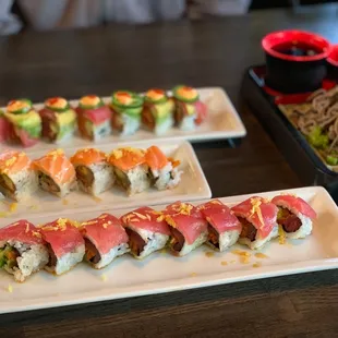 Back plate sunset rolls, middle plate omega3, front plate DHA, and right side is their soba noodles.