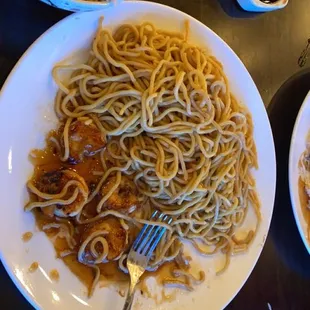 Shrimp hibachi with noodle and a side of rice.