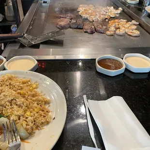 a plate of food on a grill