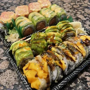 a variety of sushi rolls