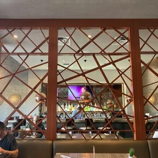 The fully stocked bar, with additional tables